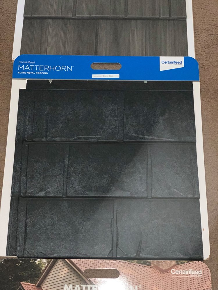 Slide of Songy's Roofing & Contractors