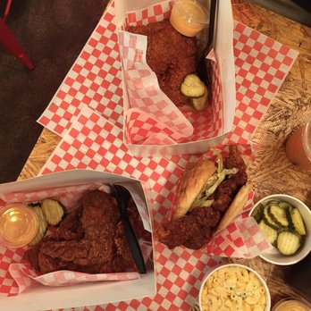 Howlin' Ray's - The feast- Half Bird, half mild half hot spicy; Fried Chicken Sandwich, medium spicy; complimentary pickles and macaroni salad - Southern Near Me - Los Angeles, California Howlin' Ray's - The feast- Half Bird, half mild half hot spicy; Fried Chicken Sandwich, medium spicy; complimentary pickles and macaroni salad - Southern Near Me - Los Angeles, California