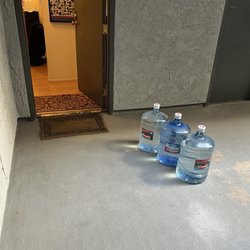 Driver used to line them up neatly against the wall.This is how delivery guy leaves your waters now