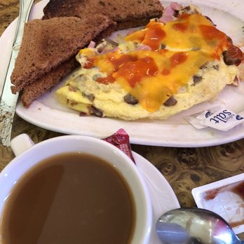The Gathering Place Restaurant - Perfect meat lover's omelette with wheat toast and weak 100% Colombian Supremo Coffee - Breakfast & Brunch Near Me - Grand Rapids, Michigan The Gathering Place Restaurant - Perfect meat lover's omelette with wheat toast and weak 100% Colombian Supremo Coffee - Breakfast & Brunch Near Me - Grand Rapids, Michigan
