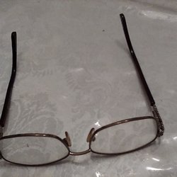 Eyelab - My own glasses. Fixed right by Uri.