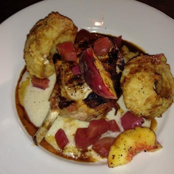 Eleven - Pork chop with peaches and best onion rings ever - New American Near Me - Pittsburgh, Pennsylvania