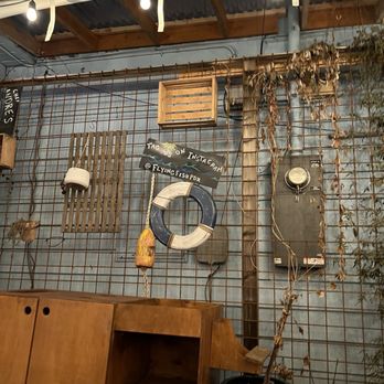 Flying Fish Oyster Bar - a variety of items on the wall - Live/Raw Food Near Me - Portland, Oregon