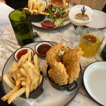 Yardbird Table & Bar - Nashville Hot Yardbird Sandwich and Yardbird Tenders - New American Near Me - Chicago, Illinois Yardbird Table & Bar - Nashville Hot Yardbird Sandwich and Yardbird Tenders - New American Near Me - Chicago, Illinois