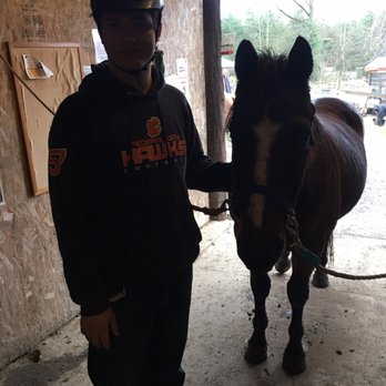 The Red Horse Farm - Cowboy and my son. Ready for a ride. - Horseback Riding Near Me - Auburn, Washington
