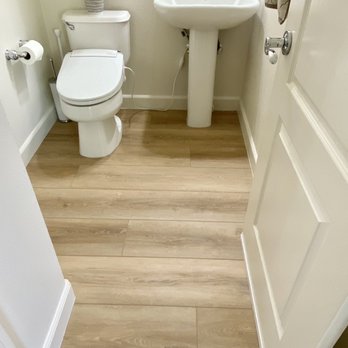 Floor Depot - Toilet and sink removed promptly during installation and white silicone caulk between the seams. - Flooring Near Me - San Jose, California Floor Depot - Toilet and sink removed promptly during installation and white silicone caulk between the seams. - Flooring Near Me - San Jose, California