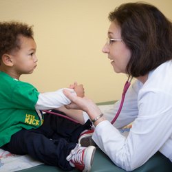 Westside Pediatrics - Dr Kisch giving an exam