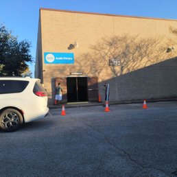 BASIS Austin Primary - Pick up/drop off doors in front of the gymnasium - shows storefront - Elementary Schools Near Me - Austin, Texas