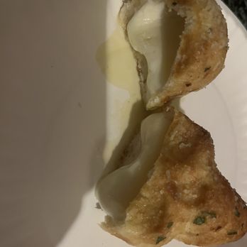 Buccaneer Pizza - Garlic knot cut in half - Pizza Near Me - Santa Ana, California Buccaneer Pizza - Garlic knot cut in half - Pizza Near Me - Santa Ana, California