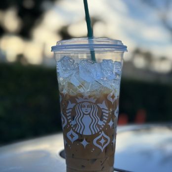 Starbucks - a cup of iced coffee on a table - Coffee & Tea Near Me - El Segundo, California Starbucks - a cup of iced coffee on a table - Coffee & Tea Near Me - El Segundo, California