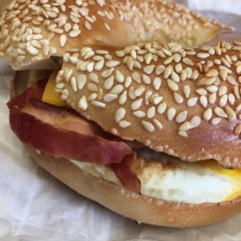 Dunkin' - Sesame toasted bagel w egg, bacon & cheese. - Donuts Near Me - Collegeville, Pennsylvania Dunkin' - Sesame toasted bagel w egg, bacon & cheese. - Donuts Near Me - Collegeville, Pennsylvania