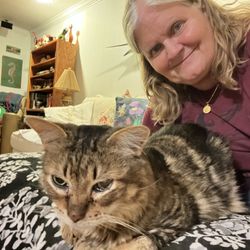 Aja Pet Service - Me and my happy kitty Rocki, who is missing her new friend Brendan.