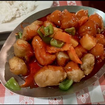 Yang's Gourmet House - Sweet and Sour Chicken. Not served hot enough but the person eating it found it fine. - Chinese Near Me - Toledo, Ohio Yang's Gourmet House - Sweet and Sour Chicken. Not served hot enough but the person eating it found it fine. - Chinese Near Me - Toledo, Ohio