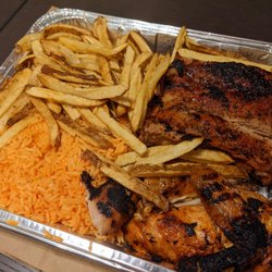 Half chicken half pork ribs combo with fries and rice
