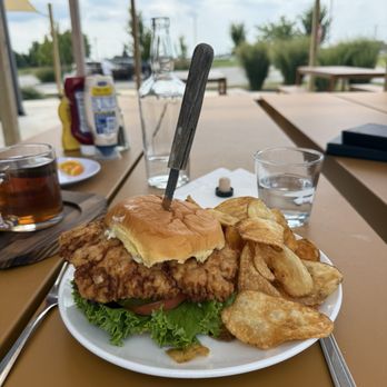 The Mash House - Fried pork tenderloin sandwich with chips - American Near Me - Westfield, Indiana The Mash House - Fried pork tenderloin sandwich with chips - American Near Me - Westfield, Indiana