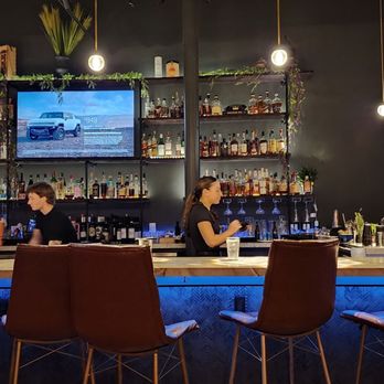 EVO - Bartenders eating with bare hands while  handling cocktails - Italian Near Me - Scottsdale, Arizona