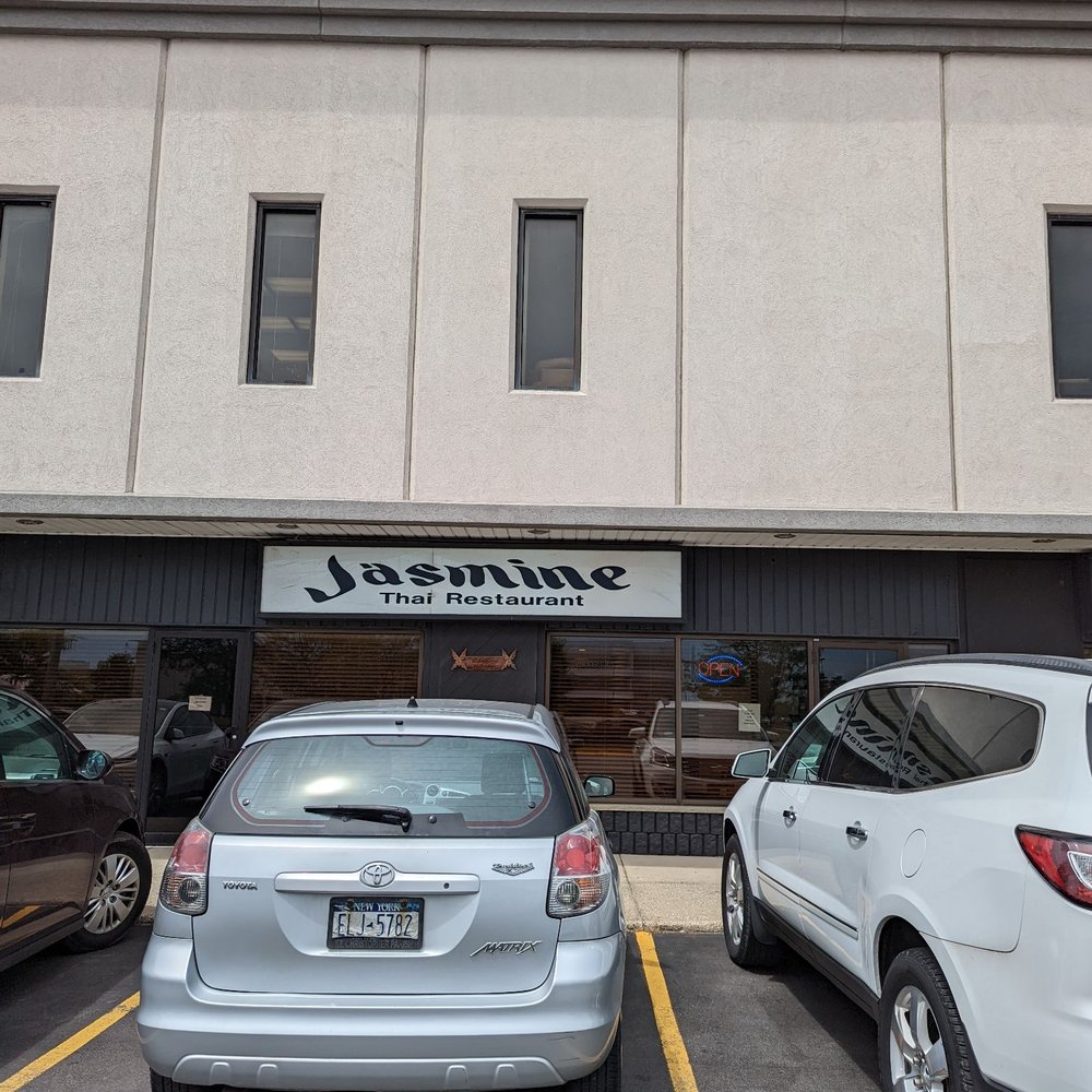 Jasmine Thai Restaurant - two cars parked in front of the building - Thai Near Me - Tonawanda, New York