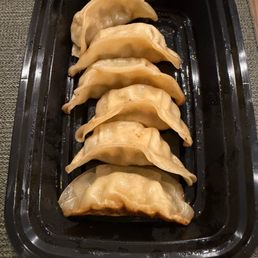 Perfectly steamed and seared gyoza. Perfectly steamed and seared gyoza.