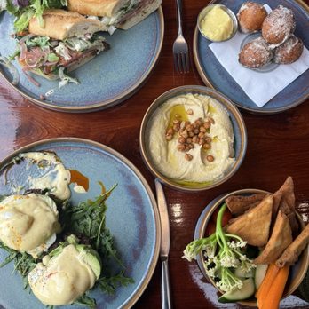 The Sur House - Porchetta sandwich. Ricotta zeppole. Hummus. Falafel Benedict. - New American Near Me - Big Sur, California