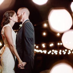 Magical Moments Weddings & Events - Gorgeous lights with enamored Mr. & Mrs.