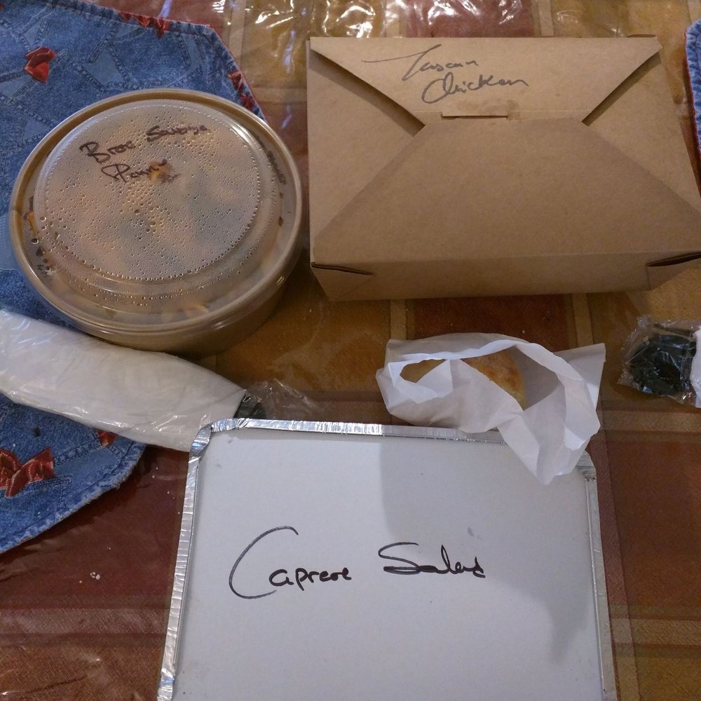 Via Cibo - the contents of a table setting - Italian Near Me - Calgary, Alberta Via Cibo - the contents of a table setting - Italian Near Me - Calgary, Alberta
