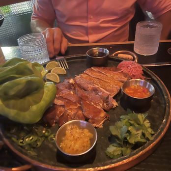 MAD - Piglet wraps (meat was a bit dry for our liking but all the contents you use to make your wrap were delicious - Spanish Near Me - Houston, Texas