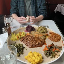 Bole Restaurant - The outer dishes made up the veggie sampler and middle two were Misto, combo meat entree of spicy and non spicy beef.