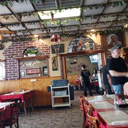 Dining areas, three zones including an intimate room, and fun memorabilia :)
