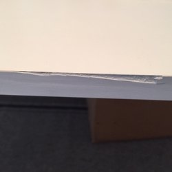 Lift & Stor Beds - Damaged edge of fold down table.