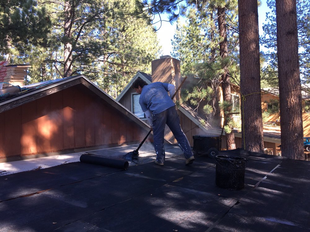 Slide of Vulcan Roofing Co