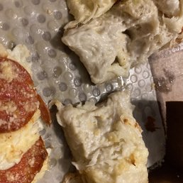 a pizza with pepperoni and cheese