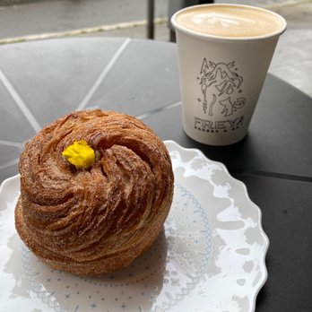 Freya Bakery & Cafe - Enjoying a latte and churro cruffin. Cruffin is super yum! Has vanilla cream in center. - Bakeries Near Me - Seattle, Washington Freya Bakery & Cafe - Enjoying a latte and churro cruffin. Cruffin is super yum! Has vanilla cream in center. - Bakeries Near Me - Seattle, Washington