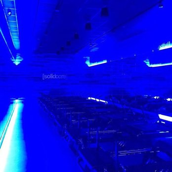 Solidcore - Blue lighting and loud club music makes this environment incredible! - Pilates Near Me - Atlanta, Georgia