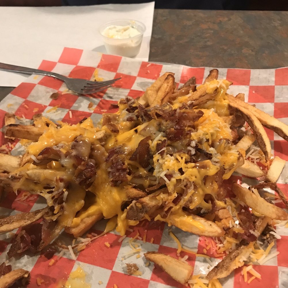 Purple Goose - a pile of fries on a red and white checkered paper - Bars Near Me - Franklin, Pennsylvania Purple Goose - a pile of fries on a red and white checkered paper - Bars Near Me - Franklin, Pennsylvania