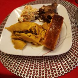 Hallaca, pan de jamón, ensalada de gallina and cochino ( pork ) Hallaca, pan de jamón, ensalada de gallina and cochino ( pork )
