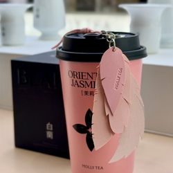 Molly Tea - Feather pendant