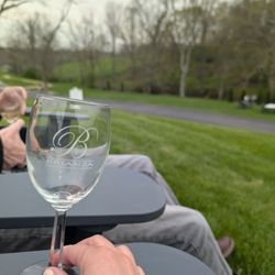 Brianza Gardens & Winery - Brianza wine glass and view of front of property