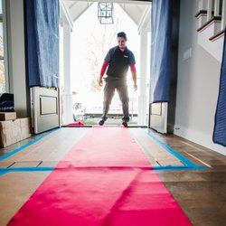 Mulder's Moving & Storage - Padding and runners protect your floor.