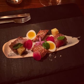 Aquavit - Mackerel and quail egg with pickled red onion and radish. This one is kind of salty, but It goes really well with wine. - Scandinavian Near Me - New York, New York