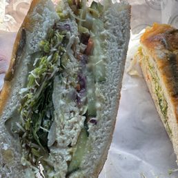 Half sandwich on jalapeño cheddar, oven roasted turkey, sprouts, spinach, pickles, cucumber, cabbage mix, olive oil/vinegar, mayo, Dijon.