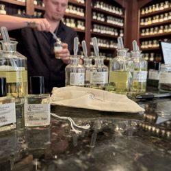 The Fragrance Boutique - Our finished products, and a few of the bottles used to create them.