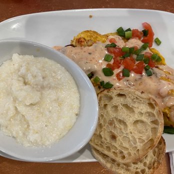 Another Broken Egg Cafe - Mardi Gras omelette with grits - Breakfast & Brunch Near Me - Pearland, Texas Another Broken Egg Cafe - Mardi Gras omelette with grits - Breakfast & Brunch Near Me - Pearland, Texas