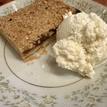 Mi Luna Cuban Cafe - Shortbread crust with guava and oats and brown sugar crumble top with vanilla ice cream - Cuban Near Me - Olympia, Washington Mi Luna Cuban Cafe - Shortbread crust with guava and oats and brown sugar crumble top with vanilla ice cream - Cuban Near Me - Olympia, Washington