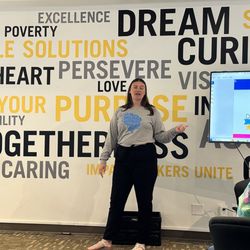 Nexus Impact Center - The incoming President of Soroptimist Indy Metro explaining how the funds raised from the charcuterie event will used.