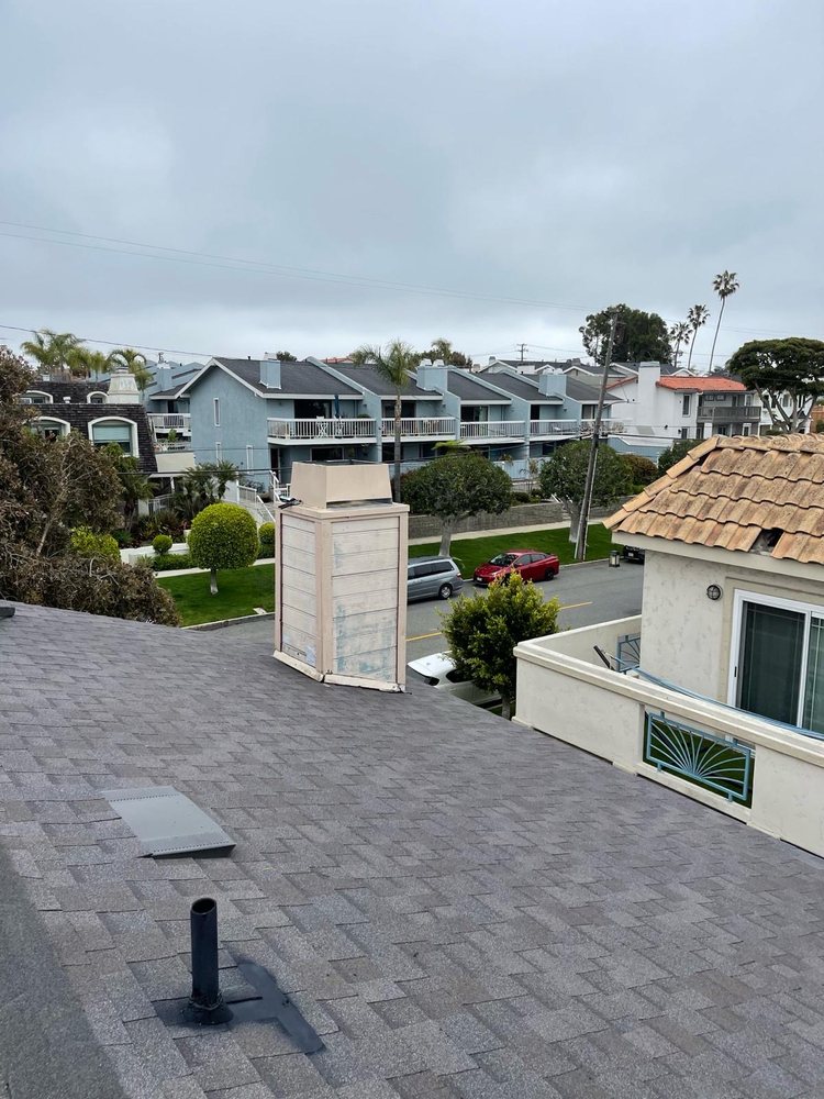 Slide of Golden Touch Roofing