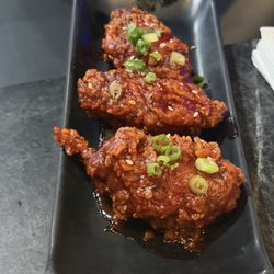Chicken wings with a lot of hot sauce