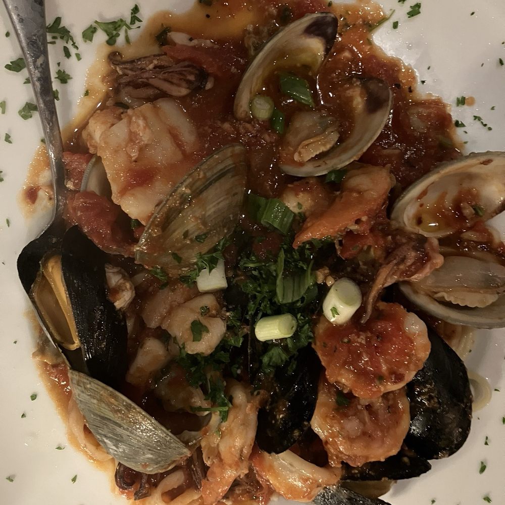 Scampi Grill - A special which had several types of seafood in a fra diavalo sauce. - Italian Near Me - Vero Beach, Florida Scampi Grill - A special which had several types of seafood in a fra diavalo sauce. - Italian Near Me - Vero Beach, Florida