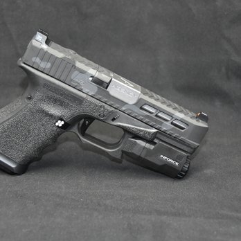 Brandon Precision - Glock 19 gen 3 with "Sinister" cut trijicon rmr and plate cover. Cerakote in black and grey camo - Gunsmith Near Me - Garden Grove, California Brandon Precision - Glock 19 gen 3 with "Sinister" cut trijicon rmr and plate cover. Cerakote in black and grey camo - Gunsmith Near Me - Garden Grove, California