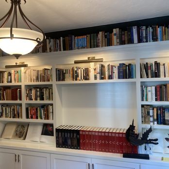 Mark Porch Construction - bookshelves and a chandelier - General Contractors Near Me