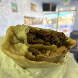 Carne Asada Burrito ($12.48) with rice, beans, and cilantro, but no onions.